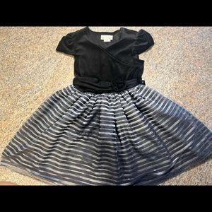 Dress has been put away after a winter formal. Hasn’t been worn since.